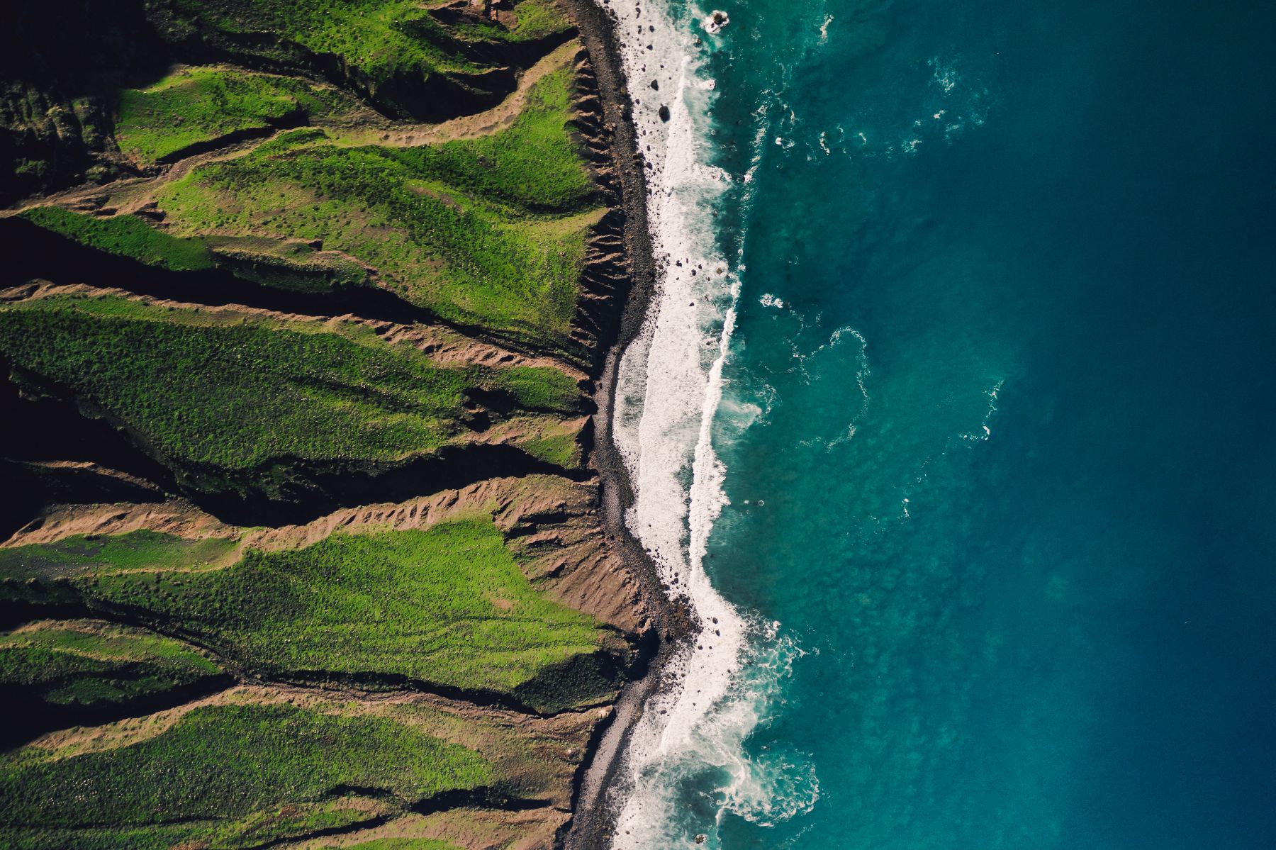 Aerial view of a hilly waterfront